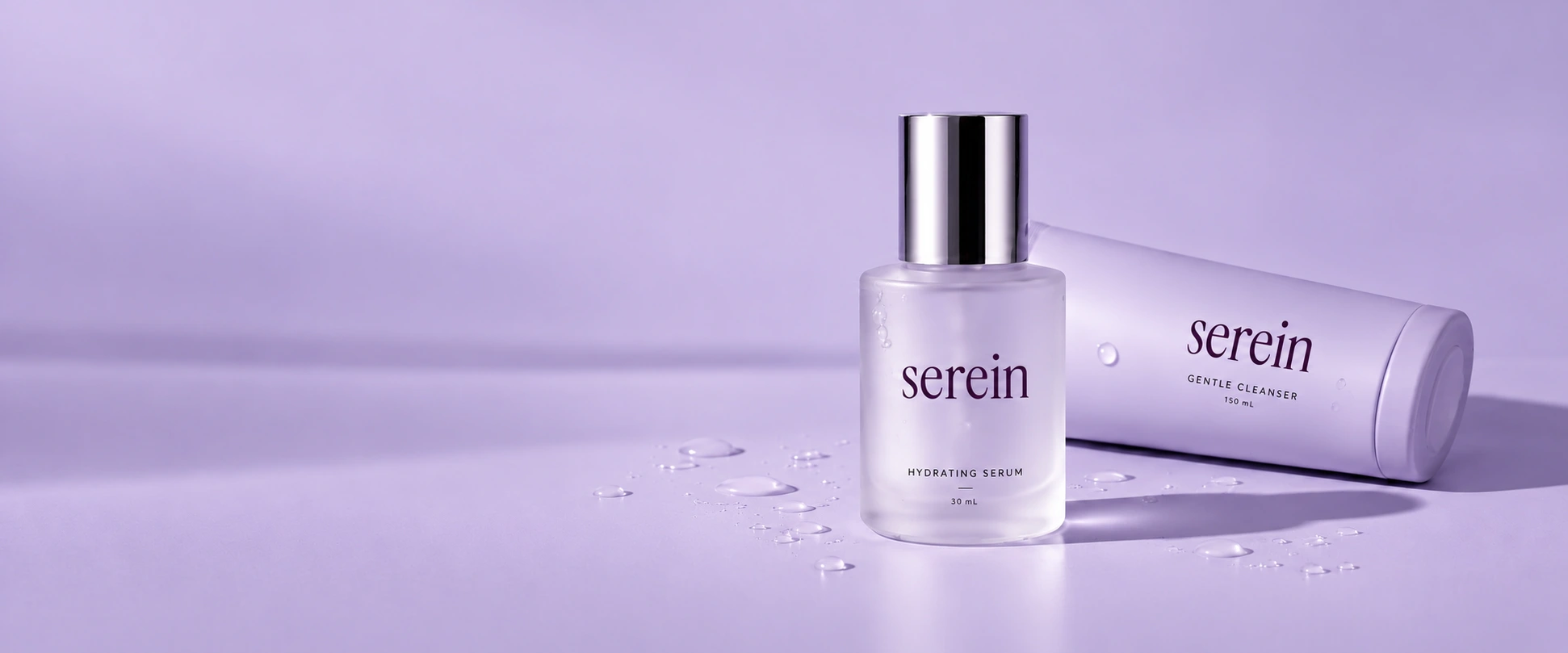 Serein lilac skincare bottles with a silver cap on a lavender backdrop